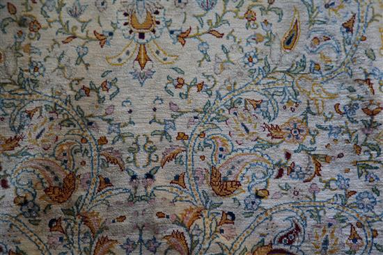 A Persian silk rug, 6ft 8in by 4ft 2in.